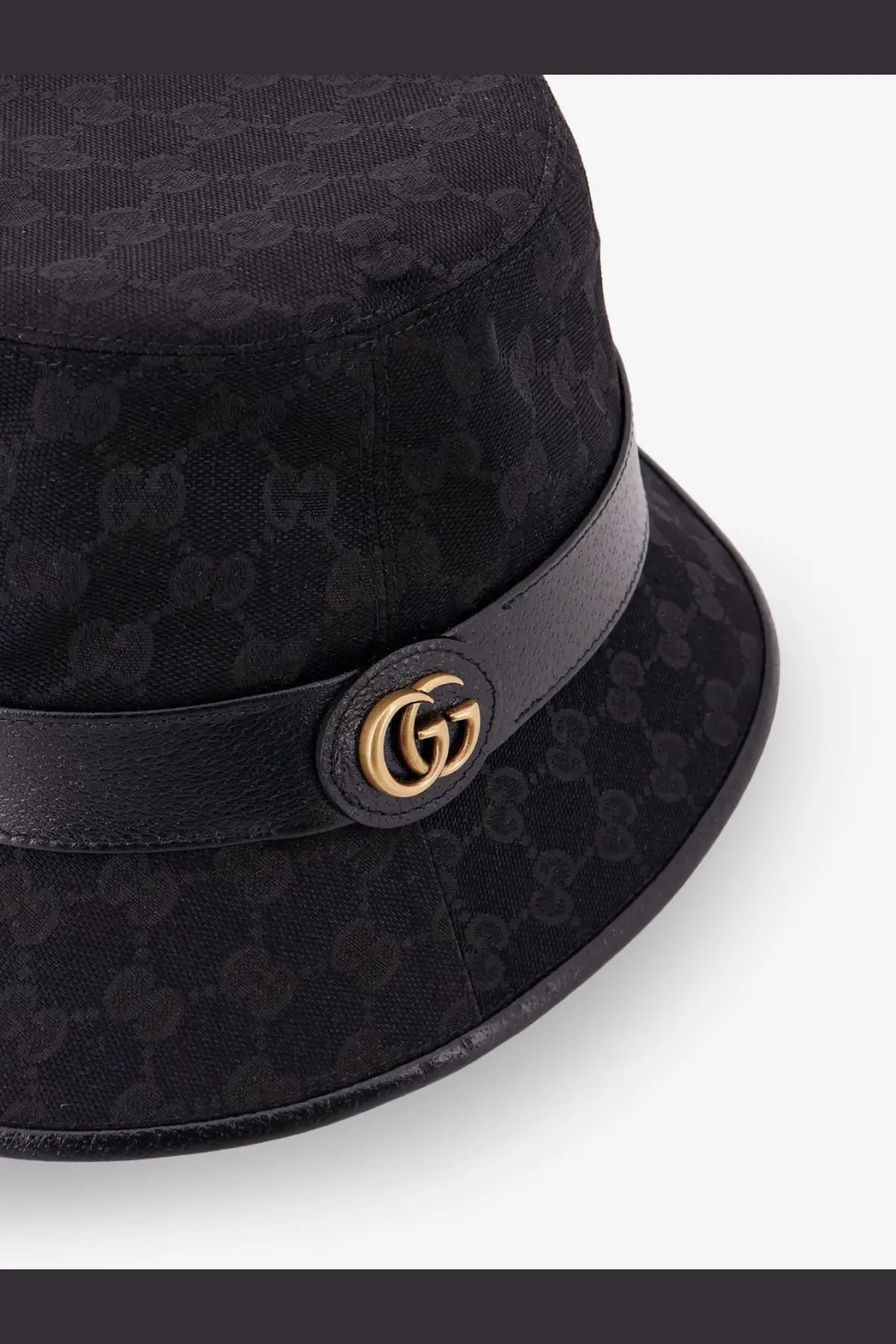 Black gucci men’s cloche bucket hat with repeating monogram fabric and gold-tone interlocking gg logo on leather band