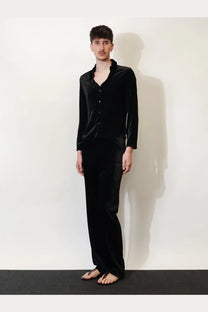 Gucci men’s black gg stretch devoré velvet trousers paired with matching black velvet pajama set shirt and pants