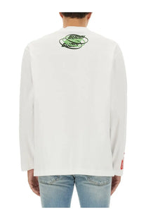 White gucci men’s long-sleeved jersey shirt with neon green and black logo on back and red sleeve cuff branding
