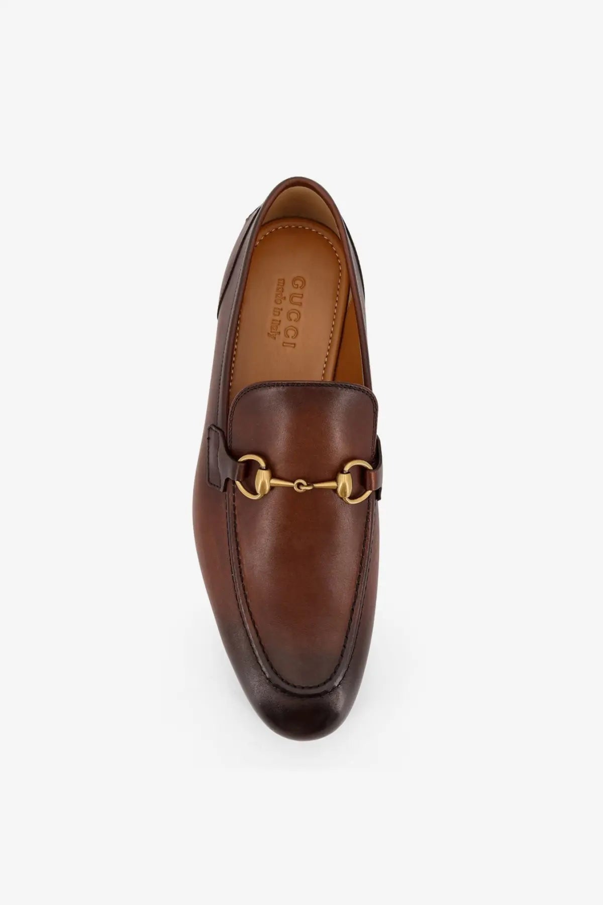 Gucci men’s Jordaan brown leather loafers with a gold-tone horsebit buckle for stylish comfort