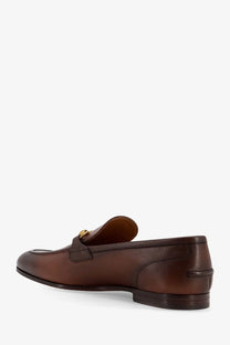 Brown leather gucci men’s jordaan loafers with gold-tone horsebit buckle