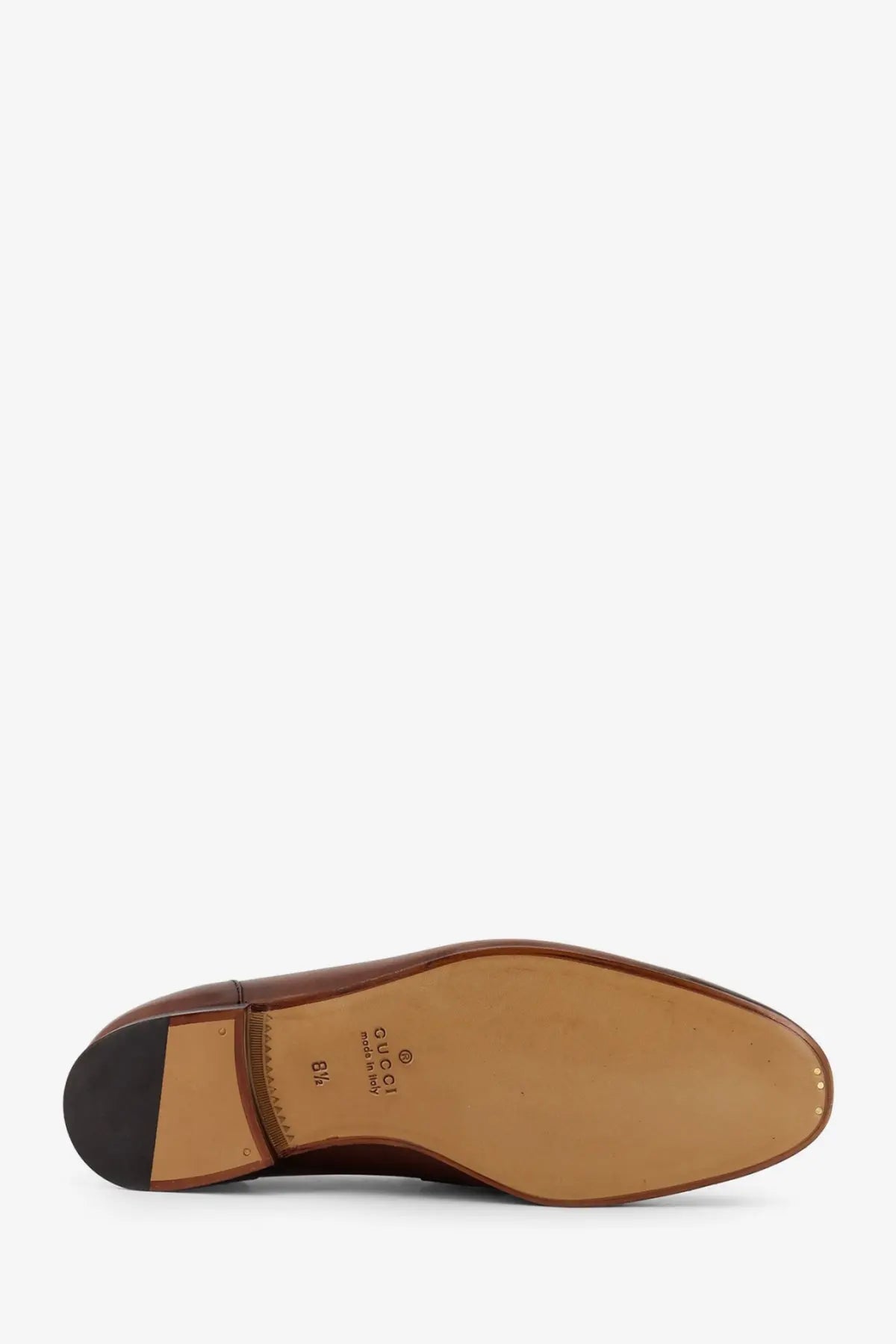 Gucci men’s Jordaan brown leather loafers with tan rubber sole and black heel for dress wear