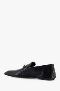 Gucci men’s black leather Ragazzo loafers with silver-toned metal buckle detail on the front side
