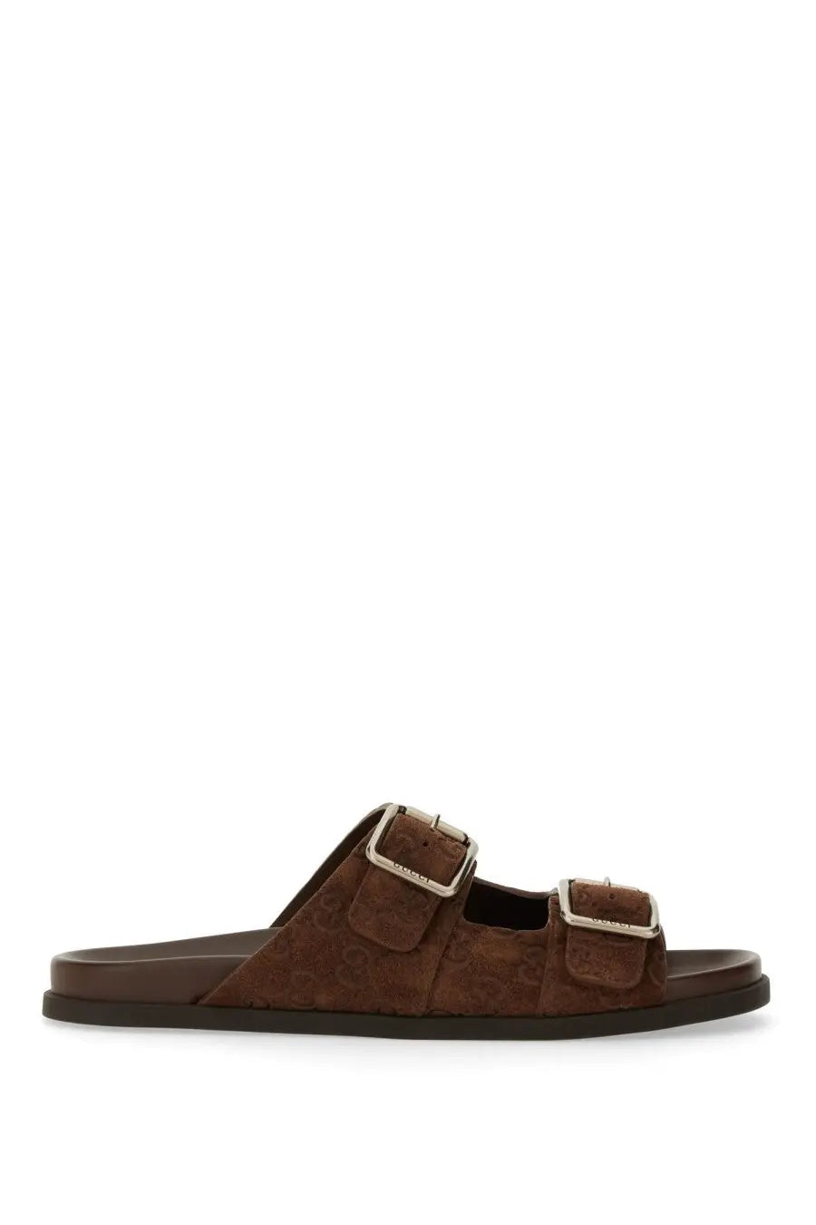 Gucci men’s leather slider sandal in brown suede with two silver buckle straps and textured pattern