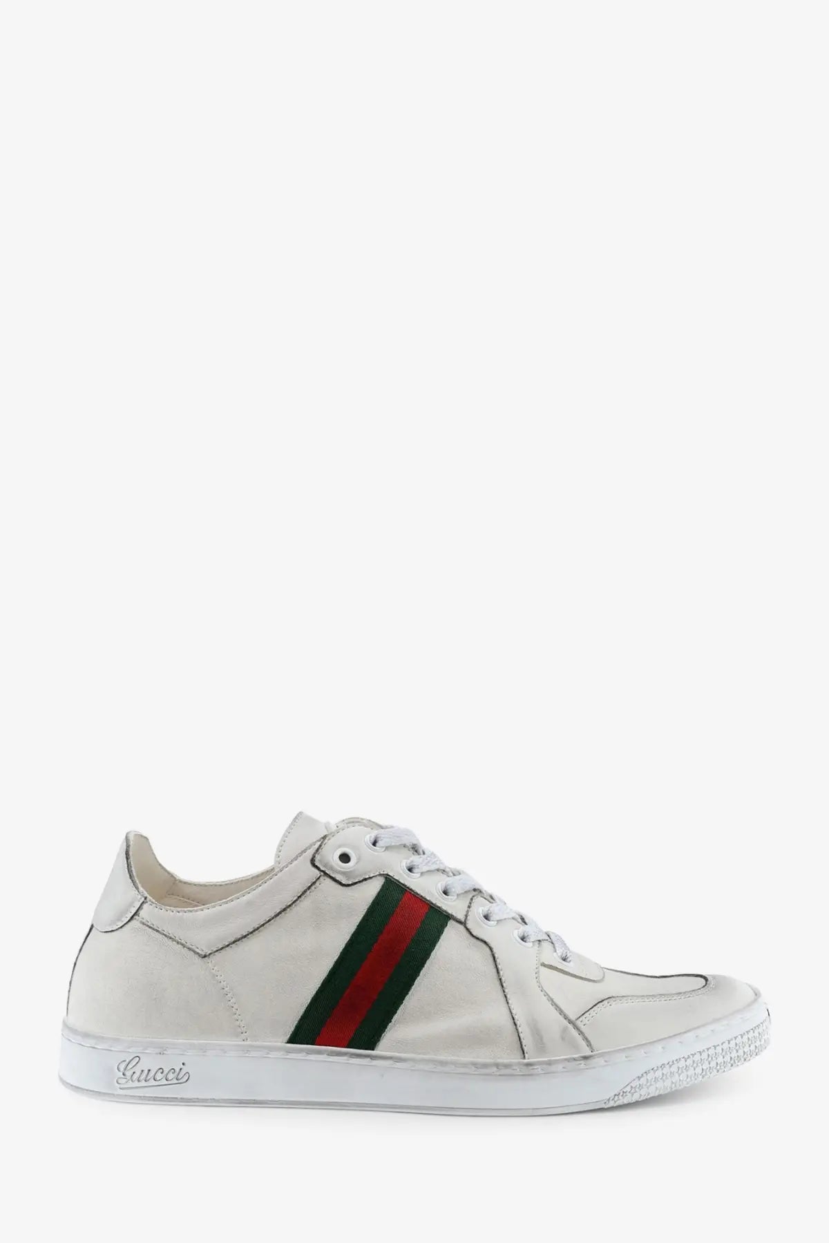Gucci men’s white leather sneakers with red and green striped band on the side for casual wear