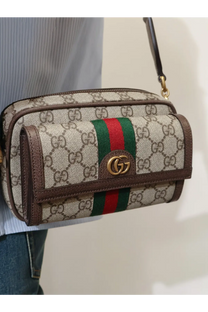 Beige and brown Gucci men’s Ophidia gg supreme canvas crossbody bag with red and green webbing stripe