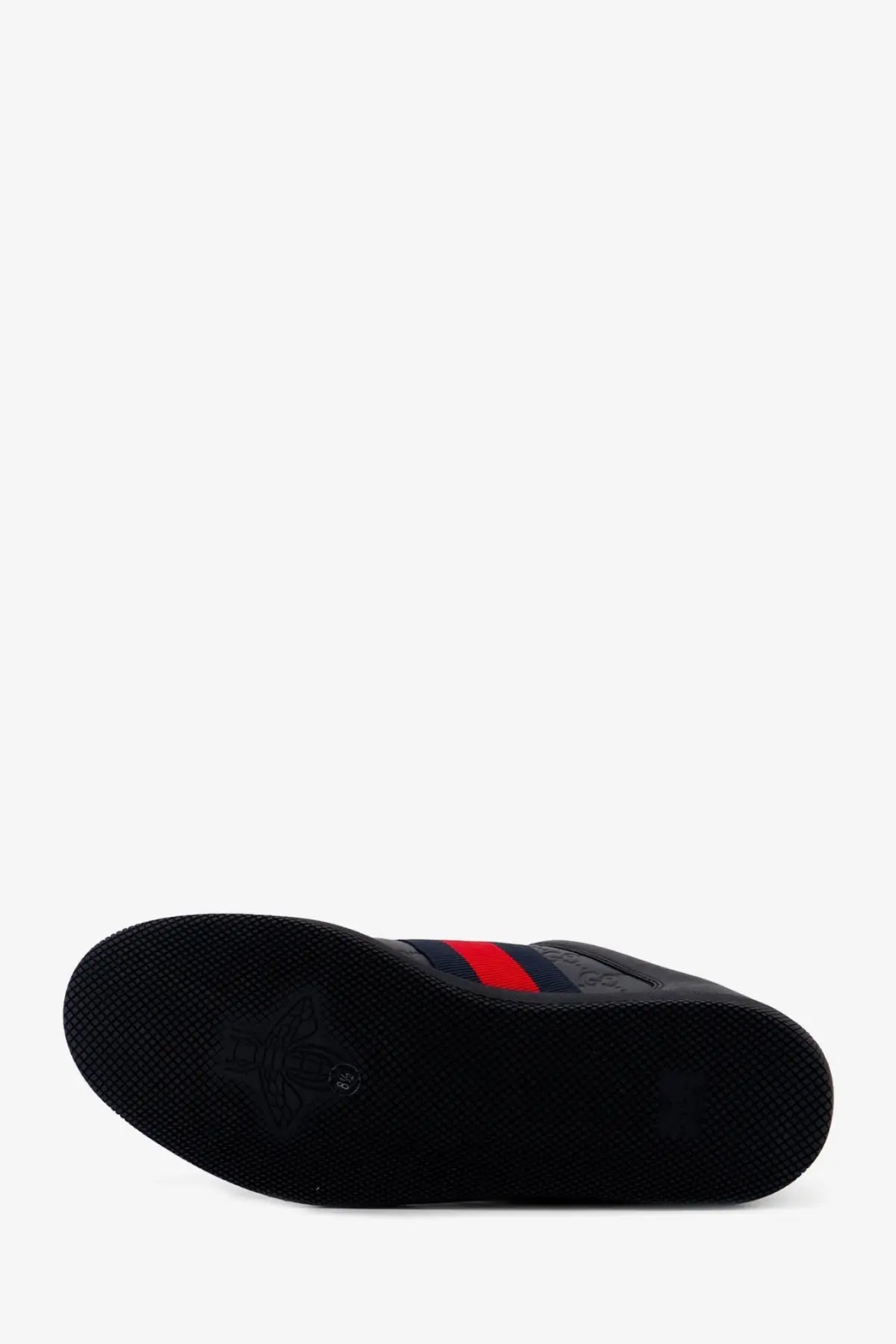Gucci men’s screener leather sneakers in black with red and navy blue striped detail on the side