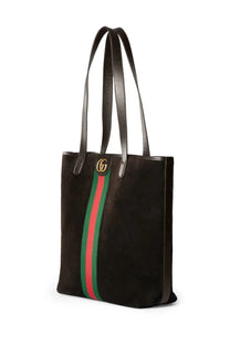 Black suede gucci men’s shopping tote bag with green and red striped webbing and gold interlocking gg logo hardware