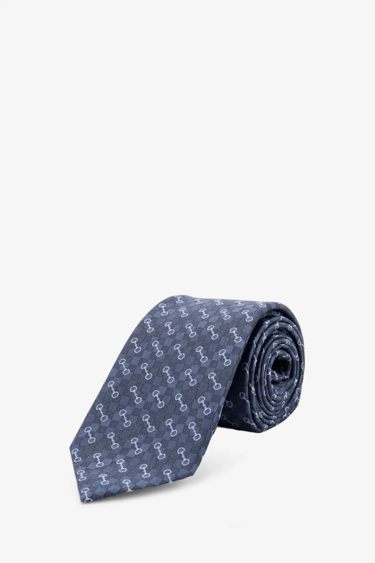 Gucci men’s silk tie in navy blue featuring a repeating light gray horsebit logo pattern