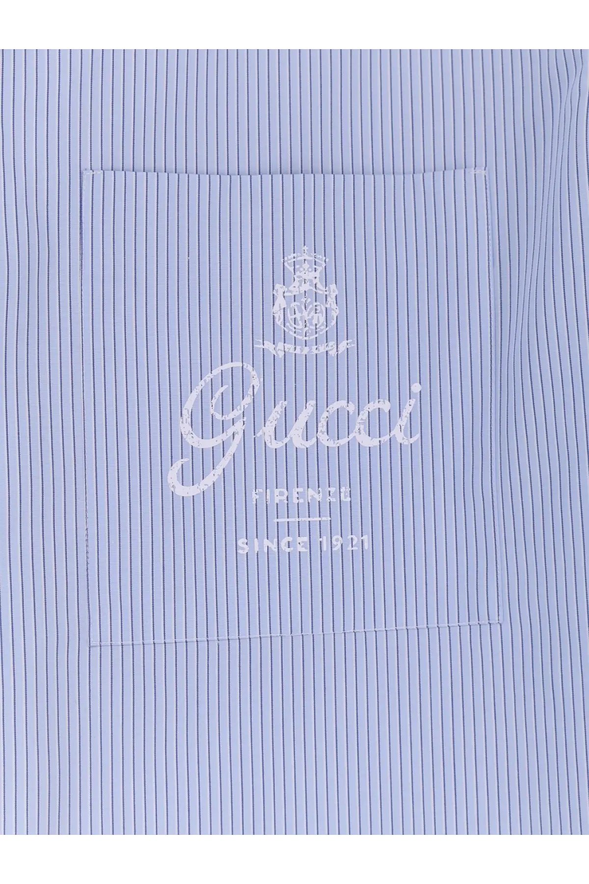 Light blue pinstripe cotton dress shirt with white embroidered Gucci logo and crest on chest pocket for men