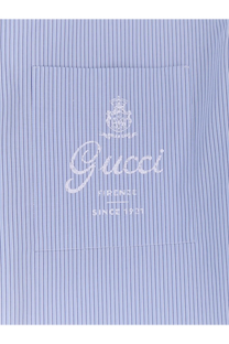 Light blue pinstripe cotton dress shirt with white embroidered Gucci logo and crest on chest pocket for men