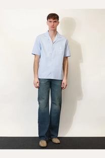 Light blue gucci men’s short-sleeved striped cotton shirt with subtle embroidered logo on the left chest