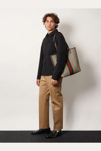 Beige and brown gucci tote bag with red and green striped shoulder strap paired with gucci mens wool shirt jacket grey