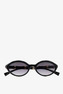 Black Gucci women’s acetate sunglasses with oval shape gold-tone bamboo temples and gradient gray lenses