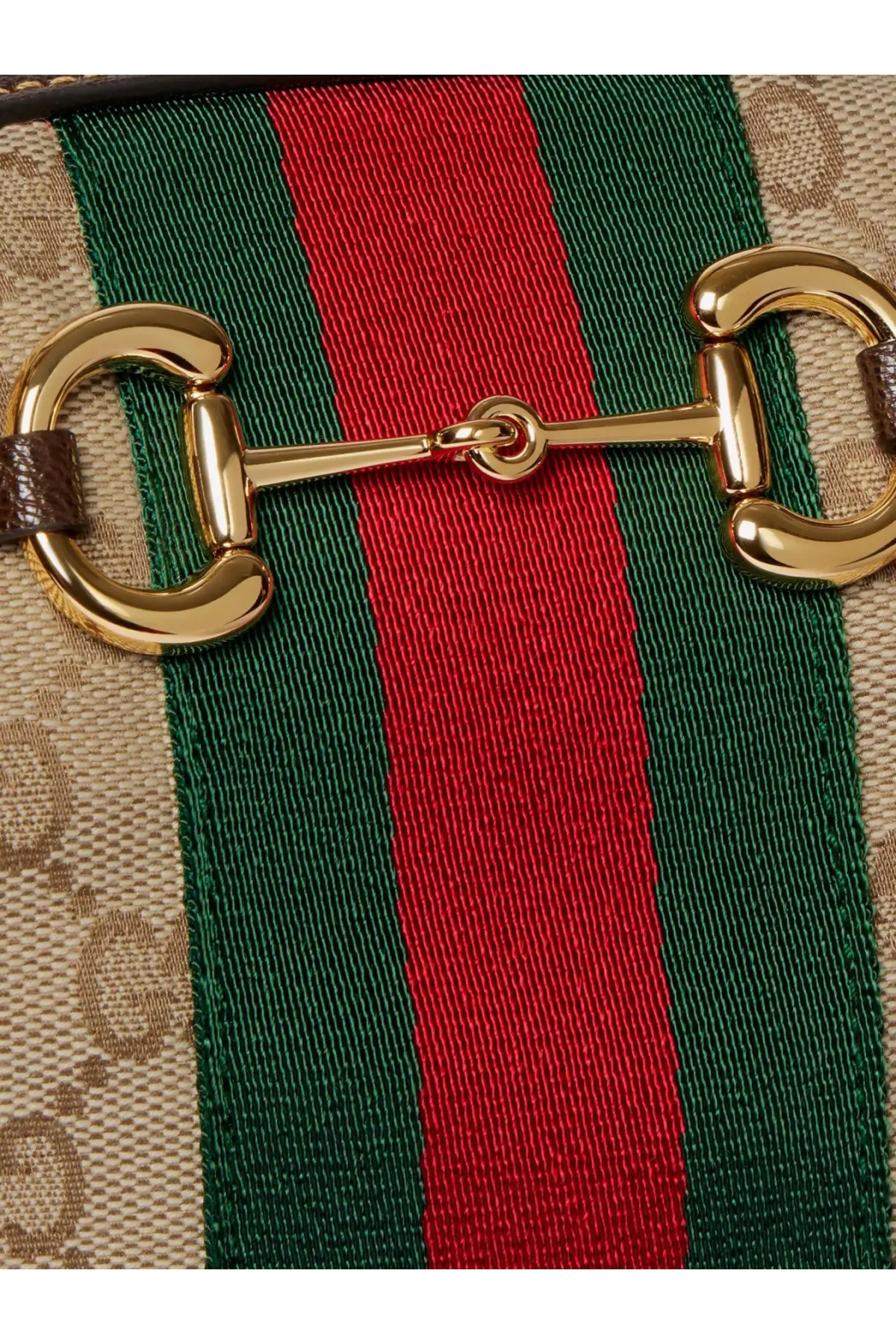 Gold-tone horsebit clasp on gucci women’s borsetto gg fabric crossbody bag beige with gg supreme canvas strap