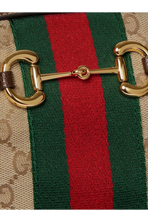 Gold-tone horsebit clasp on gucci women’s borsetto gg fabric crossbody bag beige with gg supreme canvas strap