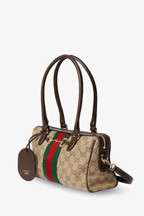 Beige Gucci women’s Borsetto GG fabric crossbody bag with brown leather handles and red and green web stripe