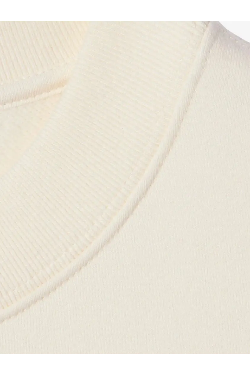 Gucci women’s cream-colored ribbed knit turtleneck sweater with soft texture and neatly stitched neckline