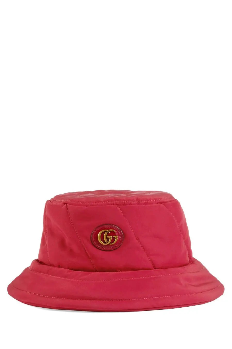 A vibrant red quilted bucket hat with gold-toned Gucci logo emblem on the front for women