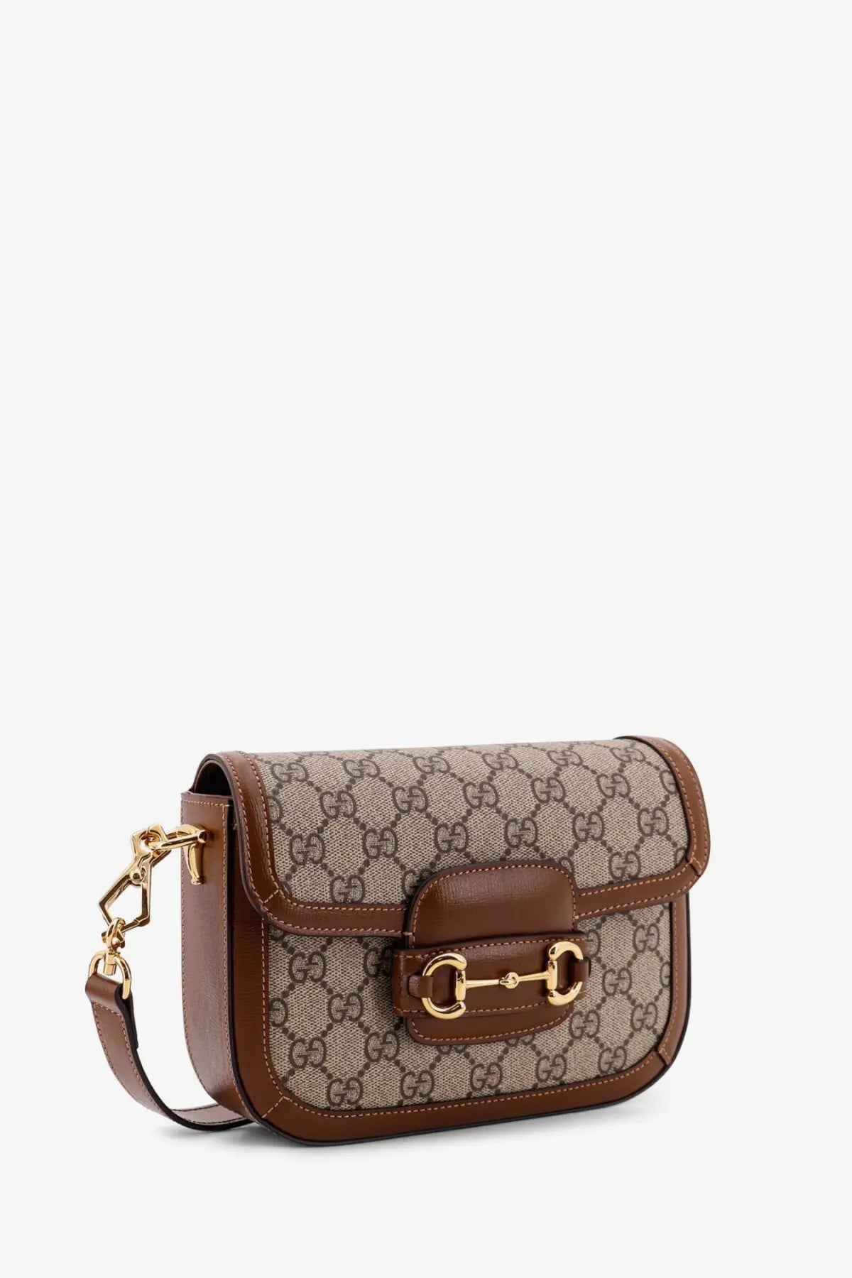 Gucci women’s coated canvas crossbody bag with brown leather trim horsebit detail in beige gg supreme canvas