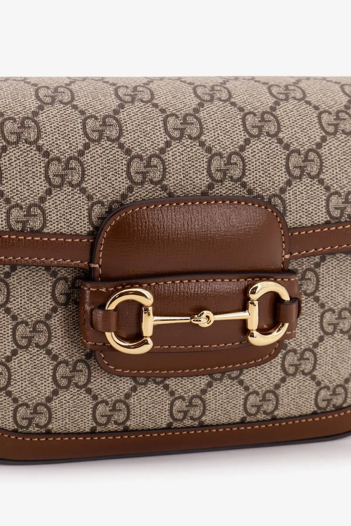 Beige and brown Gucci horsebit crossbody bag in coated canvas with signature GG monogram for women