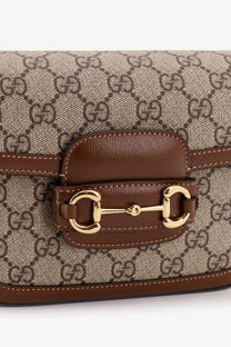 Beige and brown Gucci horsebit crossbody bag in coated canvas with signature GG monogram for women