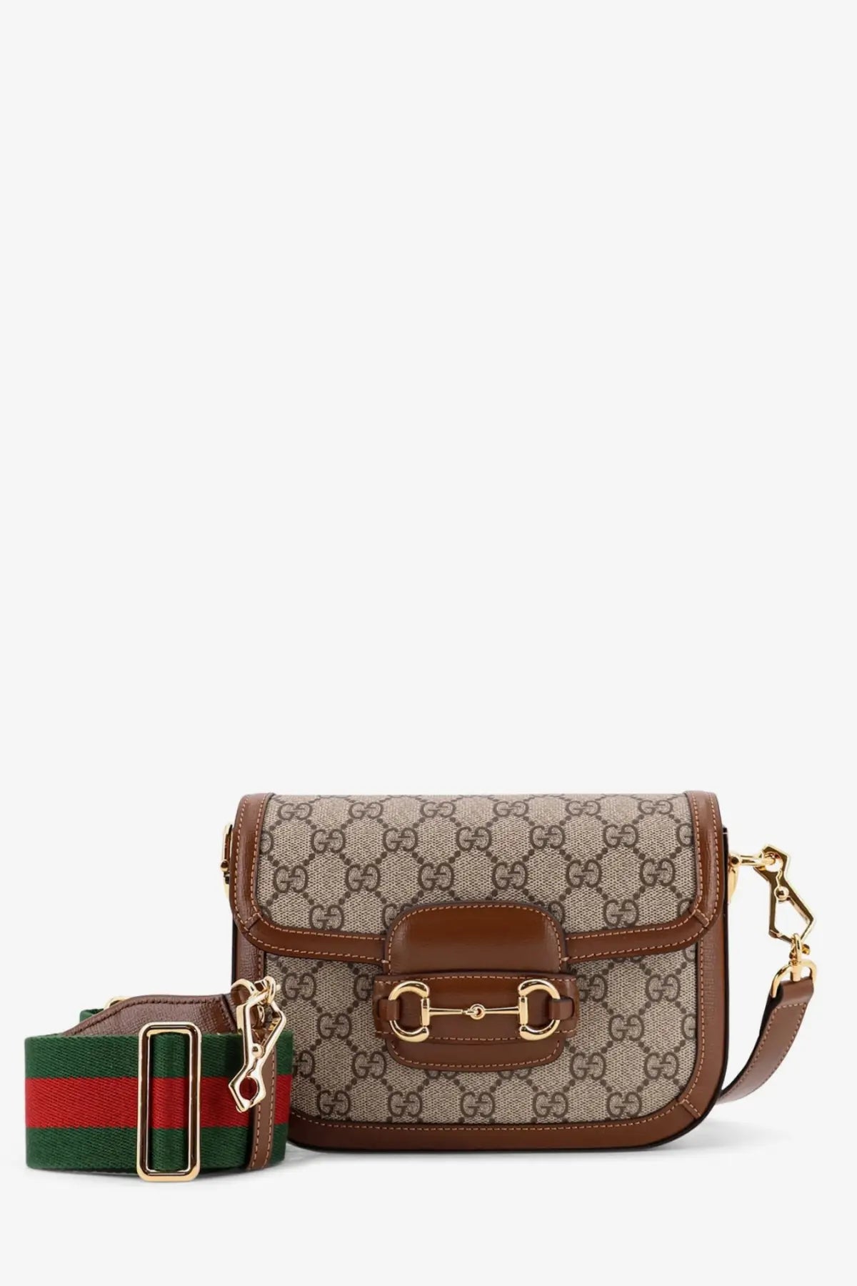 Beige and brown gucci horsebit crossbody bag in gg supreme canvas with tan leather trim and green red striped strap