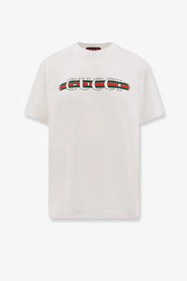 White gucci women’s cotton t shirt with bold embroidered logo and red and green stripes across the chest