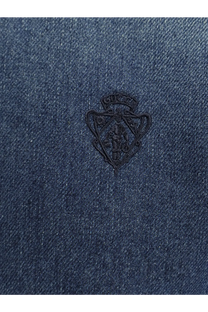 Gucci women’s denim shirt blue with dark blue denim fabric and black embroidered Gucci shield logo on front