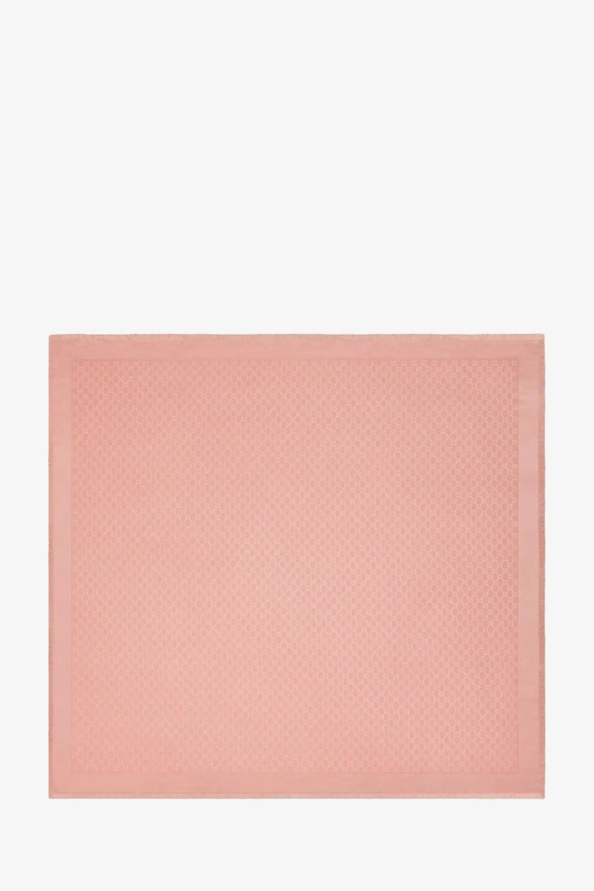 A soft pink Gucci women’s silk and wool shawl featuring a subtle textured pattern in a square pocket square design