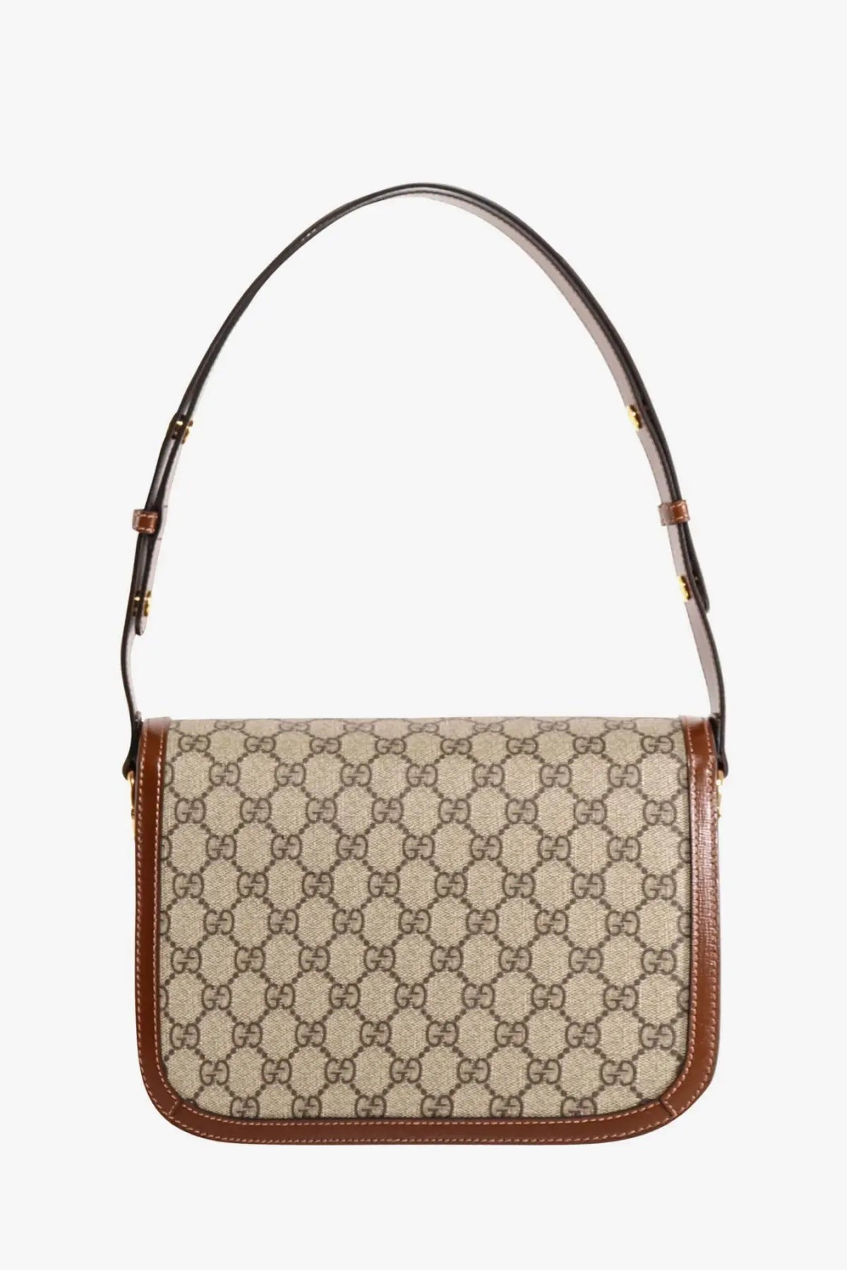 Beige and brown Gucci gg supreme canvas shoulder bag with leather trim in a brown Gucci horsebit crossbody design