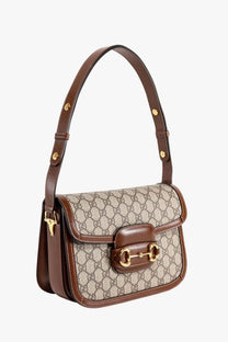 Gucci women’s brown leather shoulder bag with beige and brown gg monogram canvas and gold-tone horsebit buckle