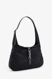 Gucci women’s black suede hobo bag with signature metal horsebit clasp and GG fabric shoulder strap