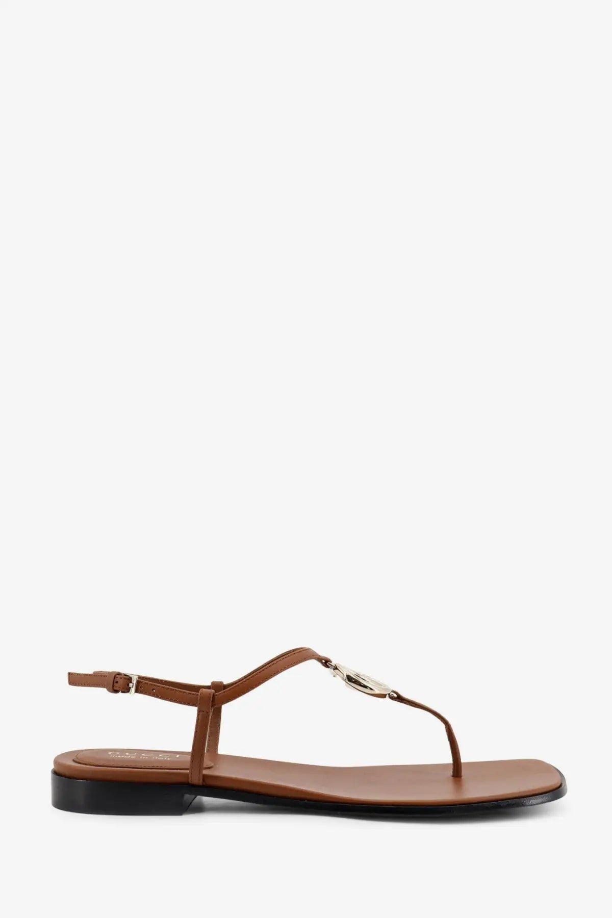 Gucci women’s lifford brown leather thong sandal with silver-toned metal logo clasp