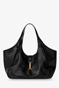 Black leather Gucci Mercato women’s shoulder bag with gold-tone horsebit hardware and adjustable strap