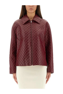 Gucci women’s oversized red leather jacket with burgundy quilted all-over interlocking gg logo pattern front view