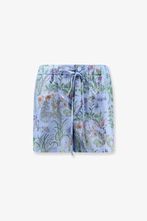 Gucci women’s printed silk shorts in light blue with detailed green orange and pink botanical floral print