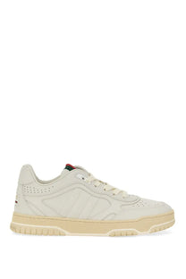 Cream-colored Gucci women’s sneaker RE Web white with perforated leather upper and red green blue tongue accents