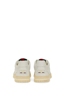 Cream-colored Gucci women’s sneaker RE Web white with perforated leather uppers and matching rubber sole