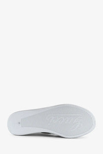 White rubber sole with textured ribbed pattern and embossed logo on gucci womens stretch leather sneakers white back side