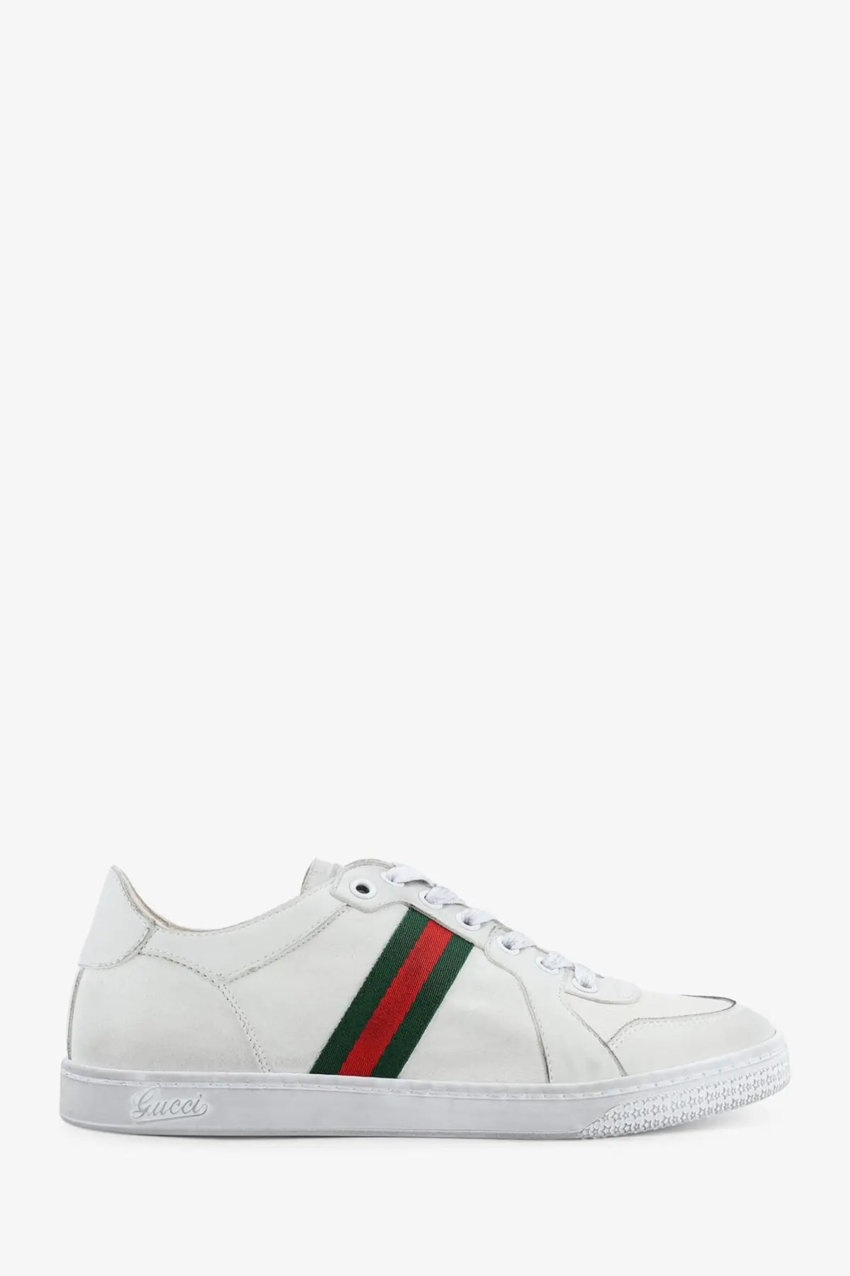 White Gucci women’s stretch leather sneakers with classic leather upper and bold red and green striped detailing