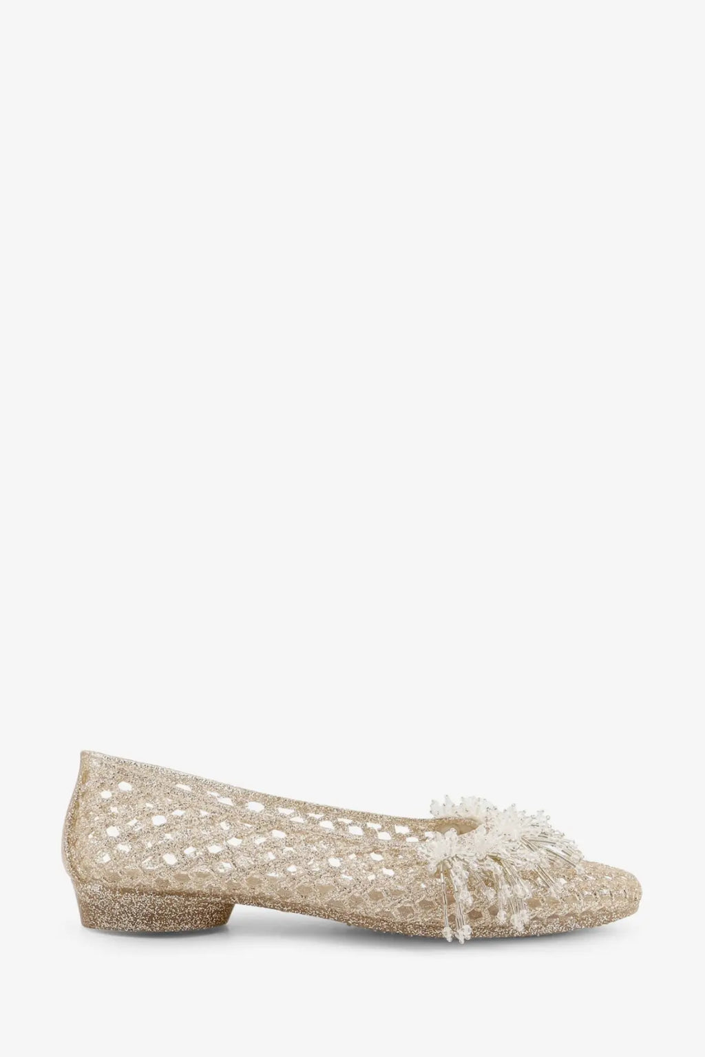 Heavenly Jelly women’s demi PVC ballerina flat shoe in gold with glitter, lace pattern, and fluffy white pom-pom accent
