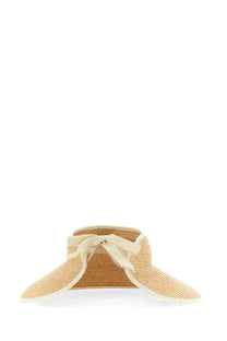 Beige straw sun visor with a matching ribbon bow at the front from Helen Kaminski women’s Cappello Mai collection