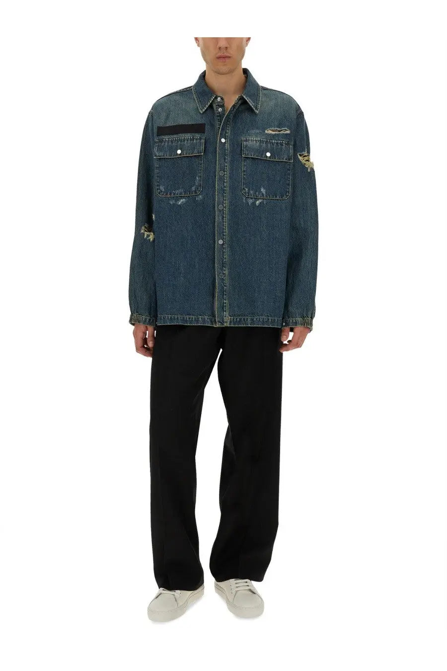 Helmut Lang men’s blue distressed denim uniform shirt with frayed patches and subtle embroidered chest logo