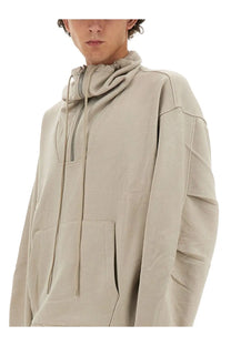 Beige helmut lang men’s zip sweatshirt with half-zip front and drawstring hood in soft fabric