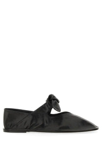 Hereu women’s ballerina black patent leather flat shoe with tied bow detail at the front