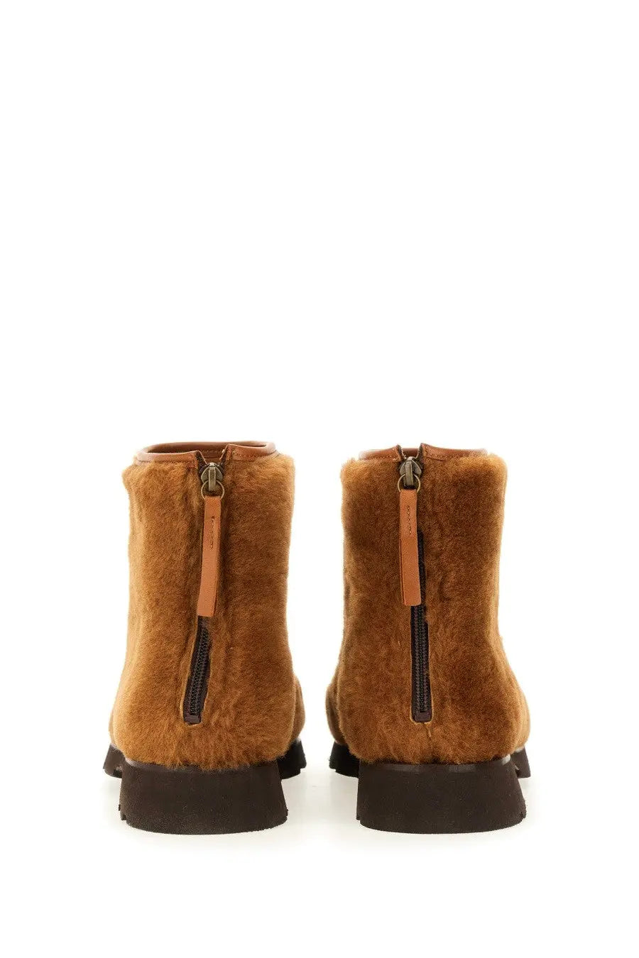 Hereu women’s boot brown tan faux fur ankle boots with black rubber soles and zipper closures