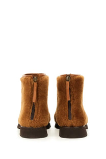 Hereu women’s boot brown tan faux fur ankle boots with black rubber soles and zipper closures
