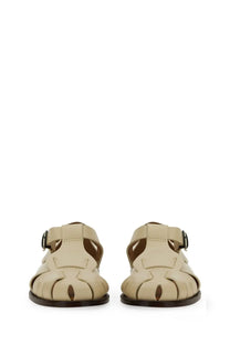 Hereu women’s sandal in peach beige leather with woven design and dark brown sole perfect for casual wear