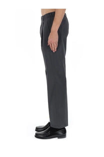 Dark gray wool blend tailored trousers by herno for men with a relaxed fit and elastic waistband